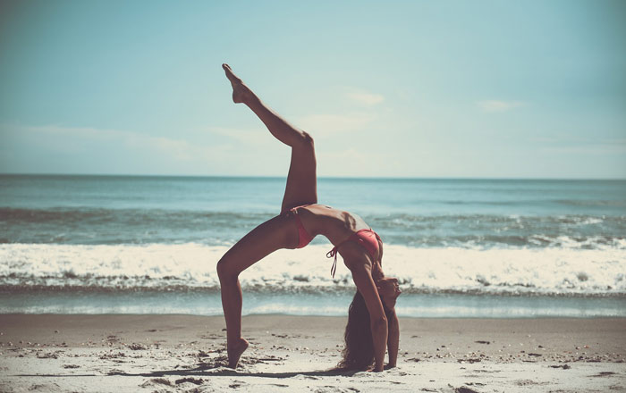 beach-yoga-woman-beach-pose-bikini-sports-fitness